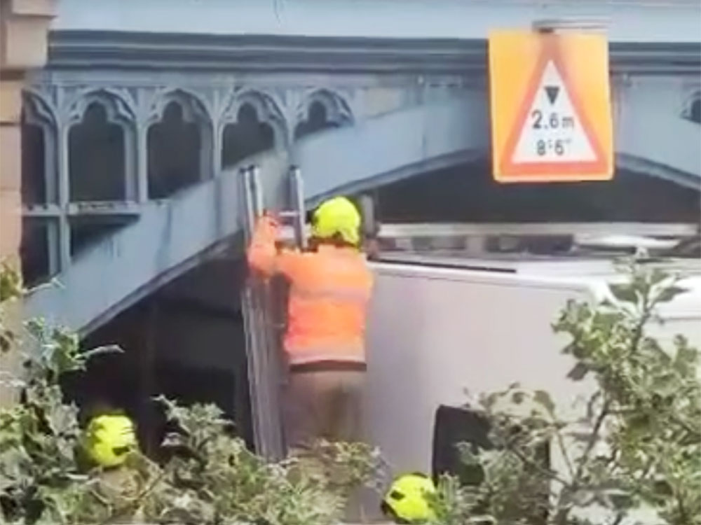 Watch: Fire service called after motorhome gets stuck under York bridge
