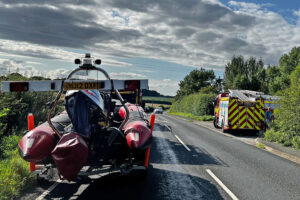Firefighters rescue man, 84, from river after he jumped in to save his dog