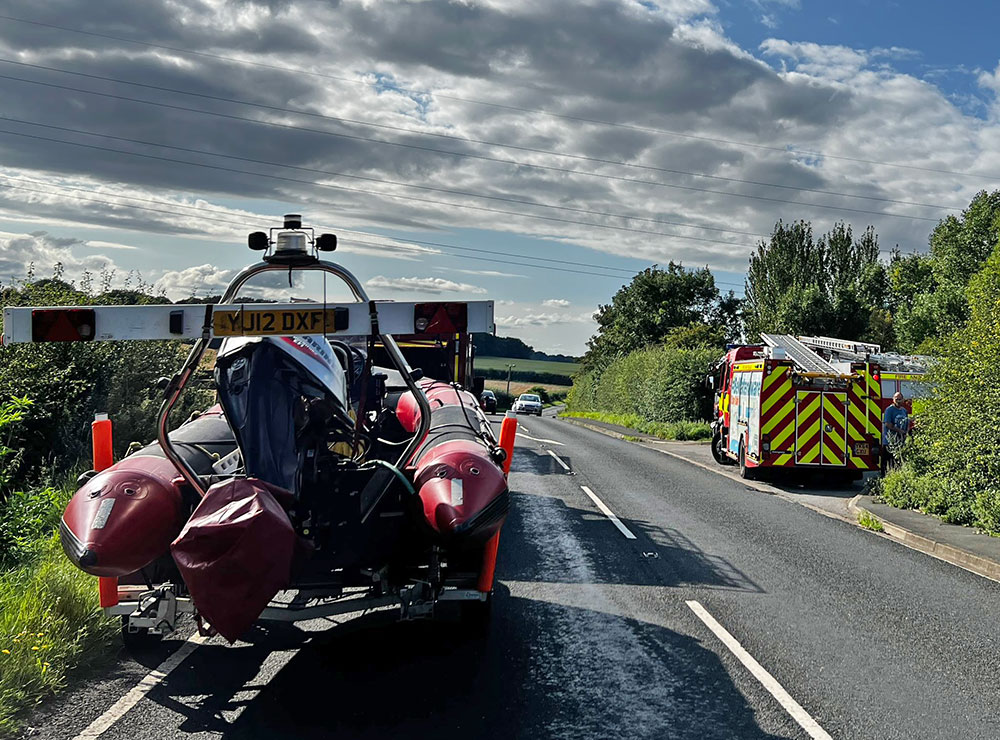 Firefighters rescue man, 84, from river after he jumped in to save his dog