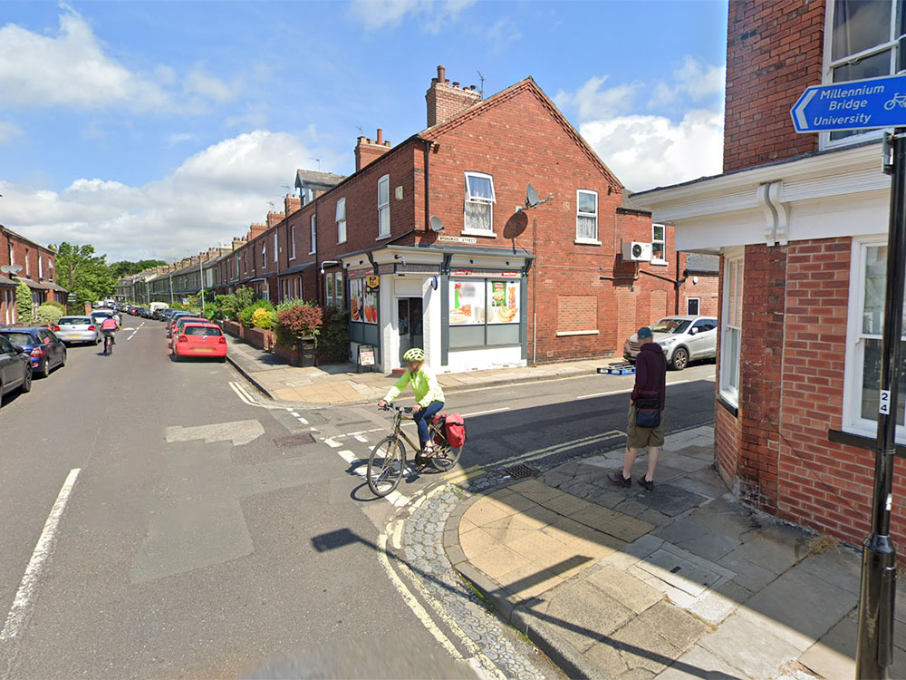 Van crashes into parked car on York street – then drives off