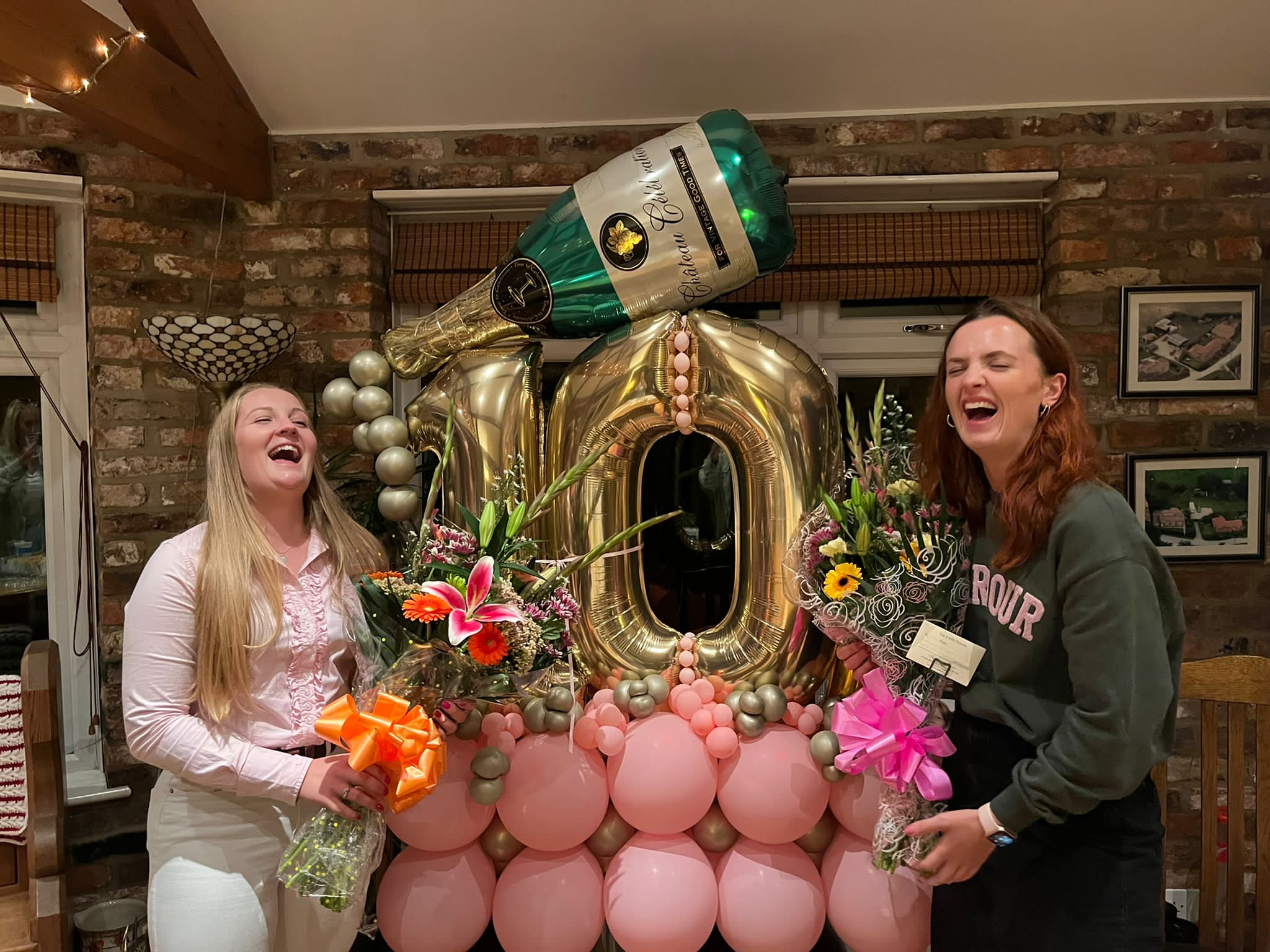 Two friends celebrate £10,000 charity milestone