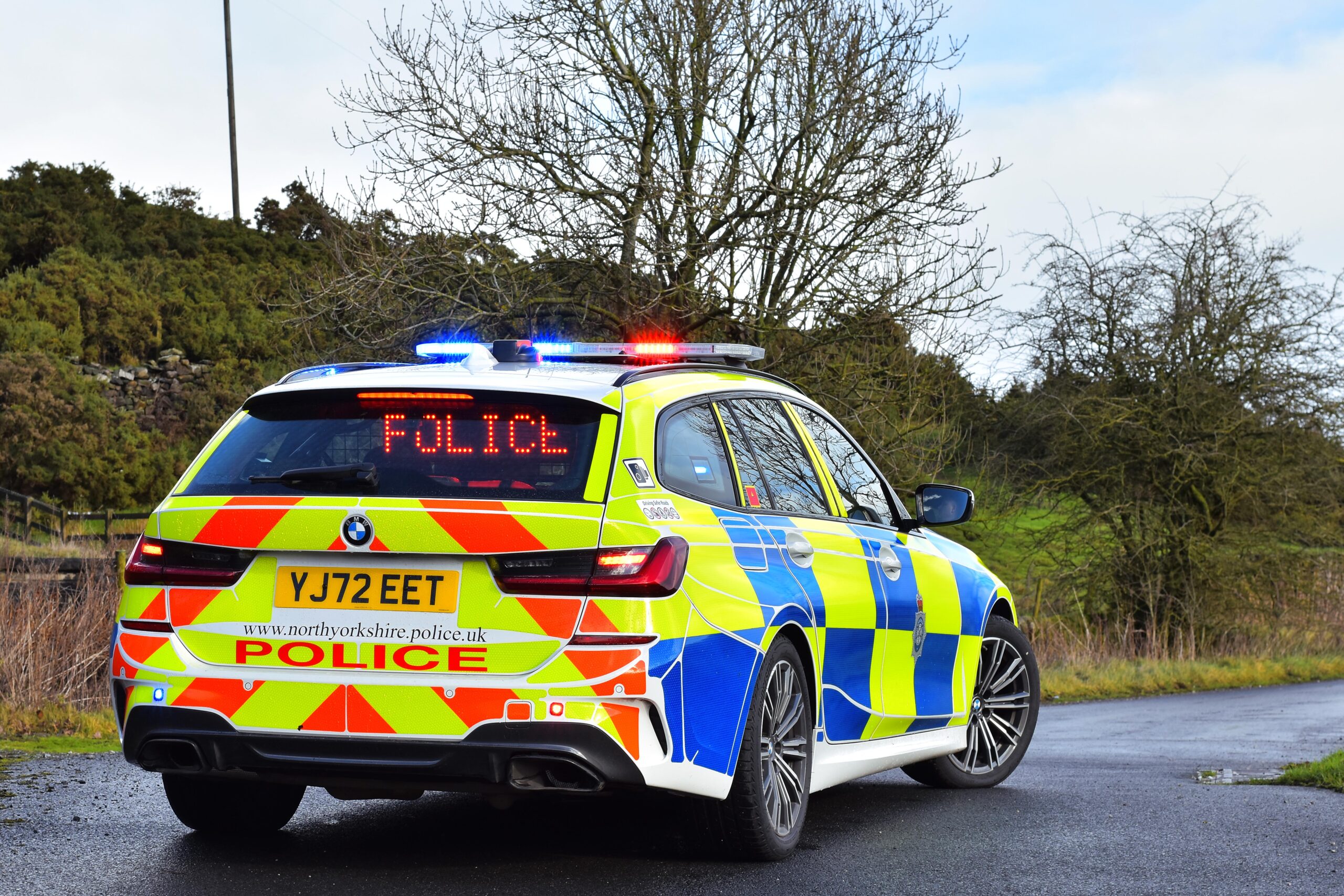 A woman has died after a collision involving bus and car