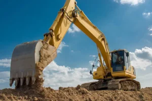 Landowner uses JCB to move fire away from hedge