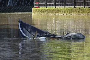 Boat sinks in York river as flood levels peak