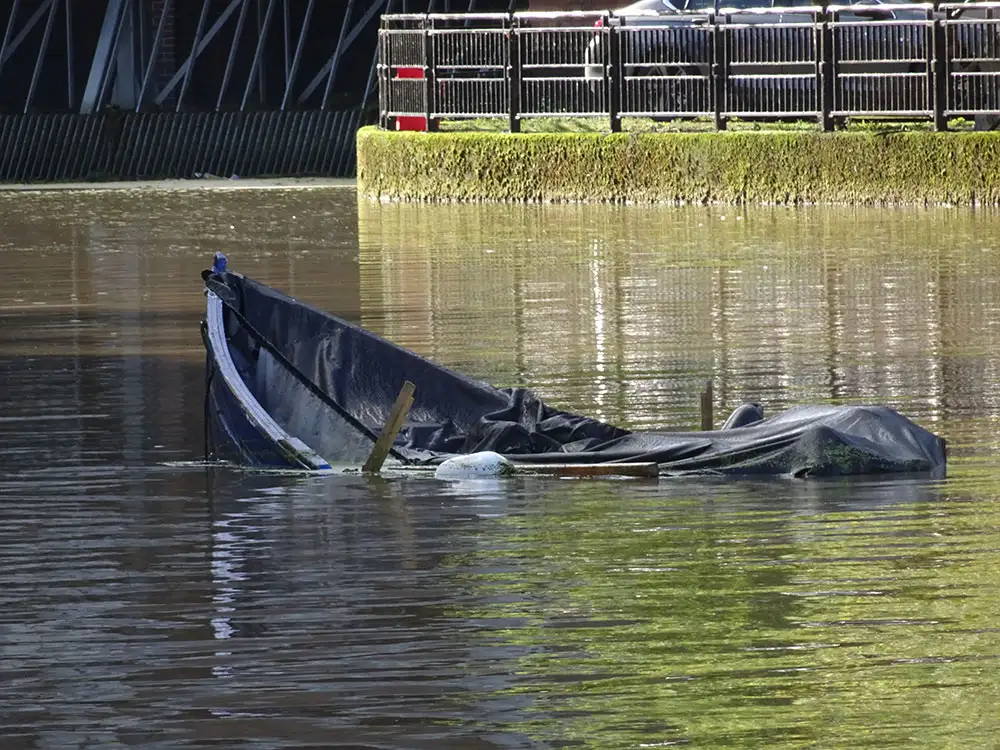 Boat sinks in York river as flood levels peak