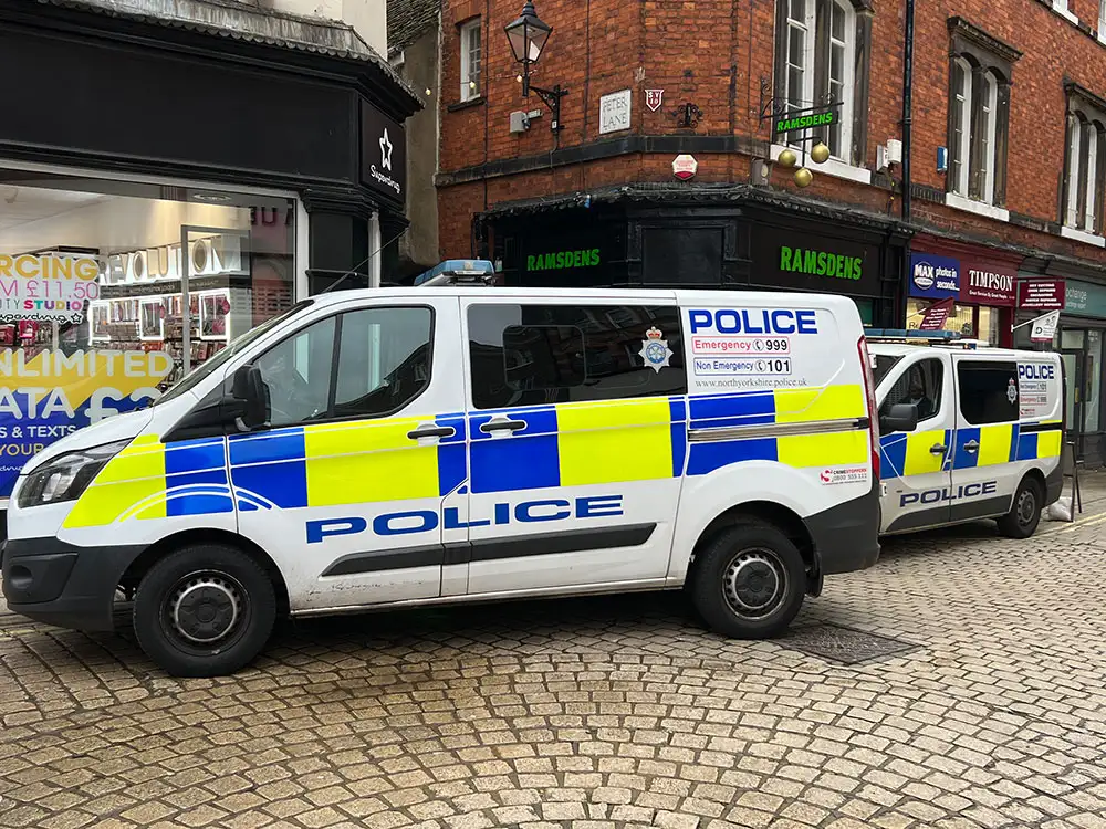 Updated: Police seal off York alleyway after man spotted on roof