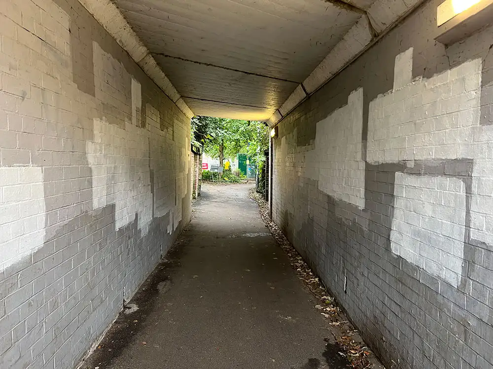 Vandals daub graffiti on York walkway