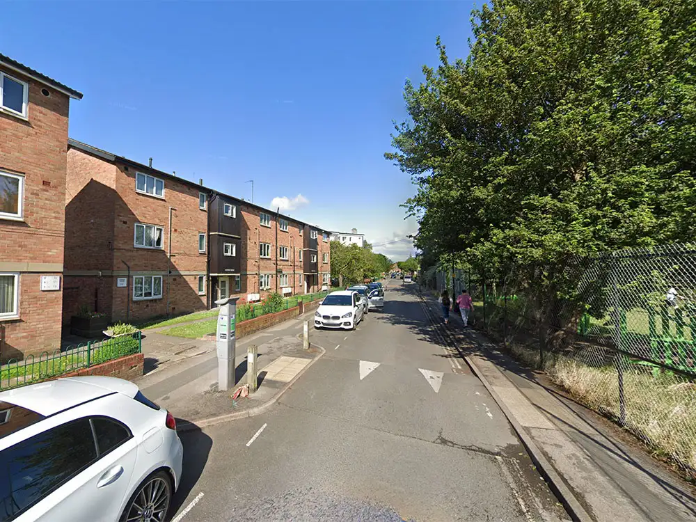 Woman in the care of paramedics after flat fire in York