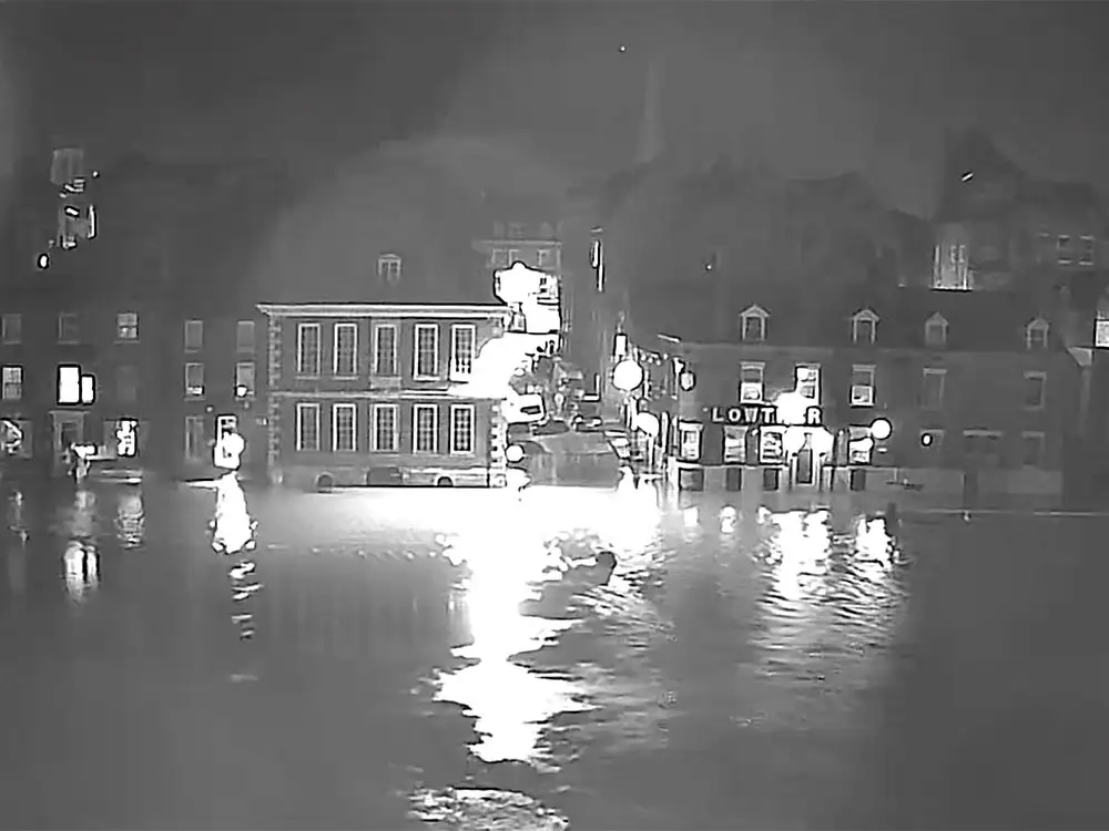 Watch: Woman rescued after entering flooded York river