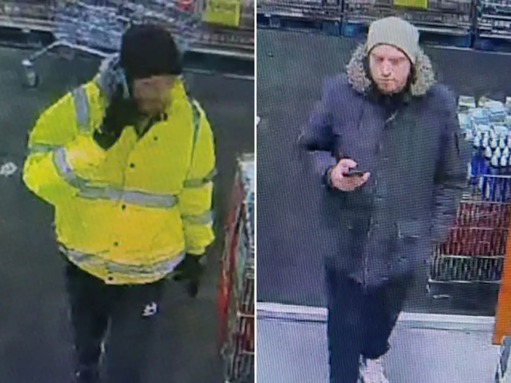 Two men walk off with an armchair from a Harrogate shop