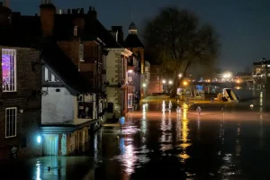 River levels hit new peak in the current flood – Water covers York road at both ends
