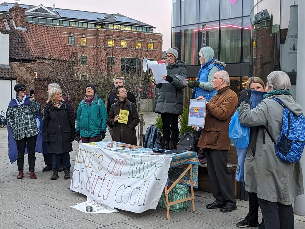 Climate activists protest against York business – and are targeted by egg-throwing youths