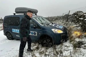 Council transport boss rescued after van slides off an ungritted road in the snow