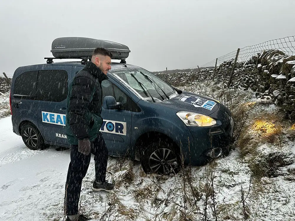 Council transport boss rescued after van slides off an ungritted road in the snow