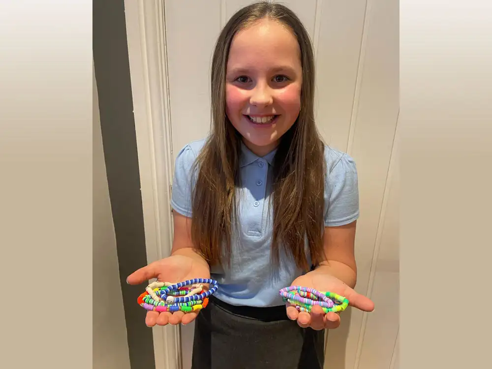 Heidi, 10, raises more than £300 for charity with her homemade bracelets
