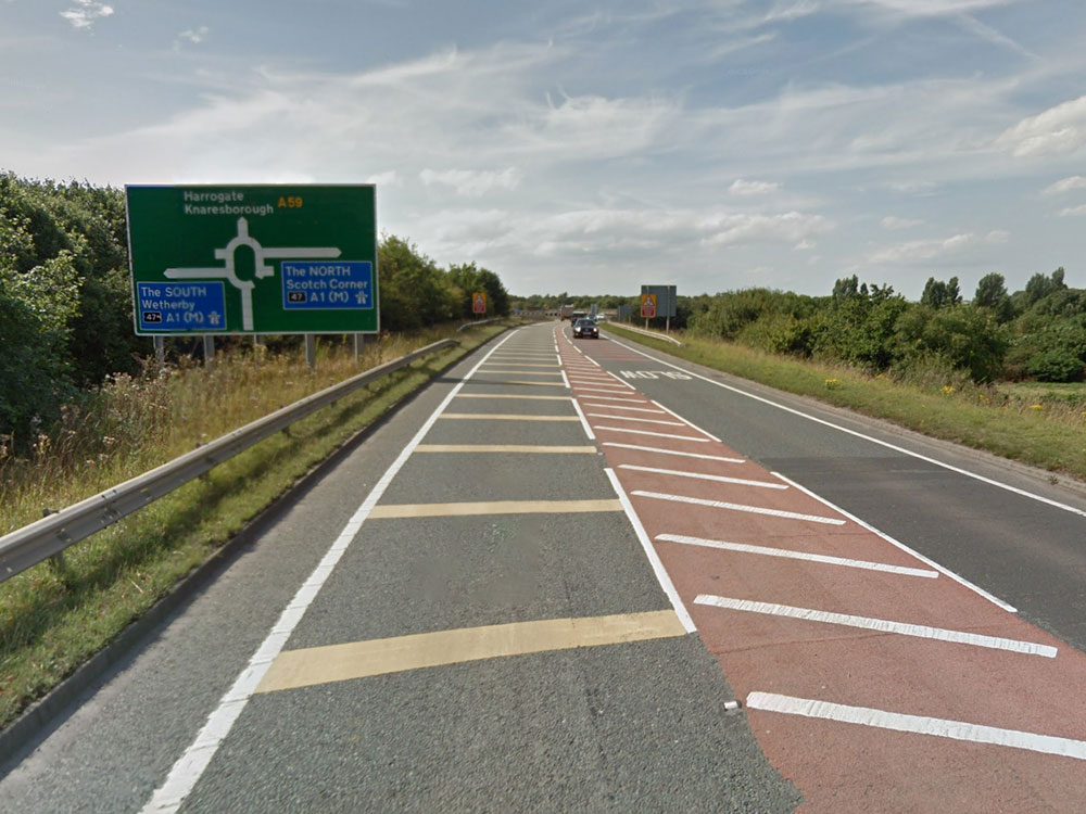 Woman and children hurt in hit-and-run crash at busy junction
