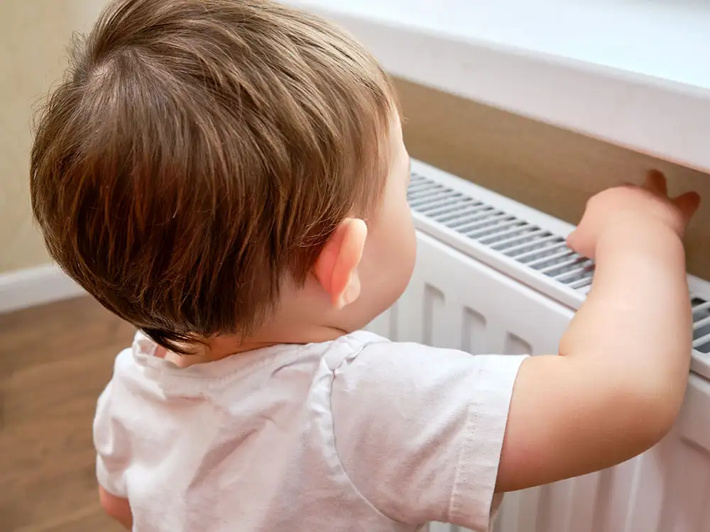 York child rescued after getting stuck behind a radiator