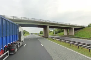 Driver killed after lorry crashes into bridge