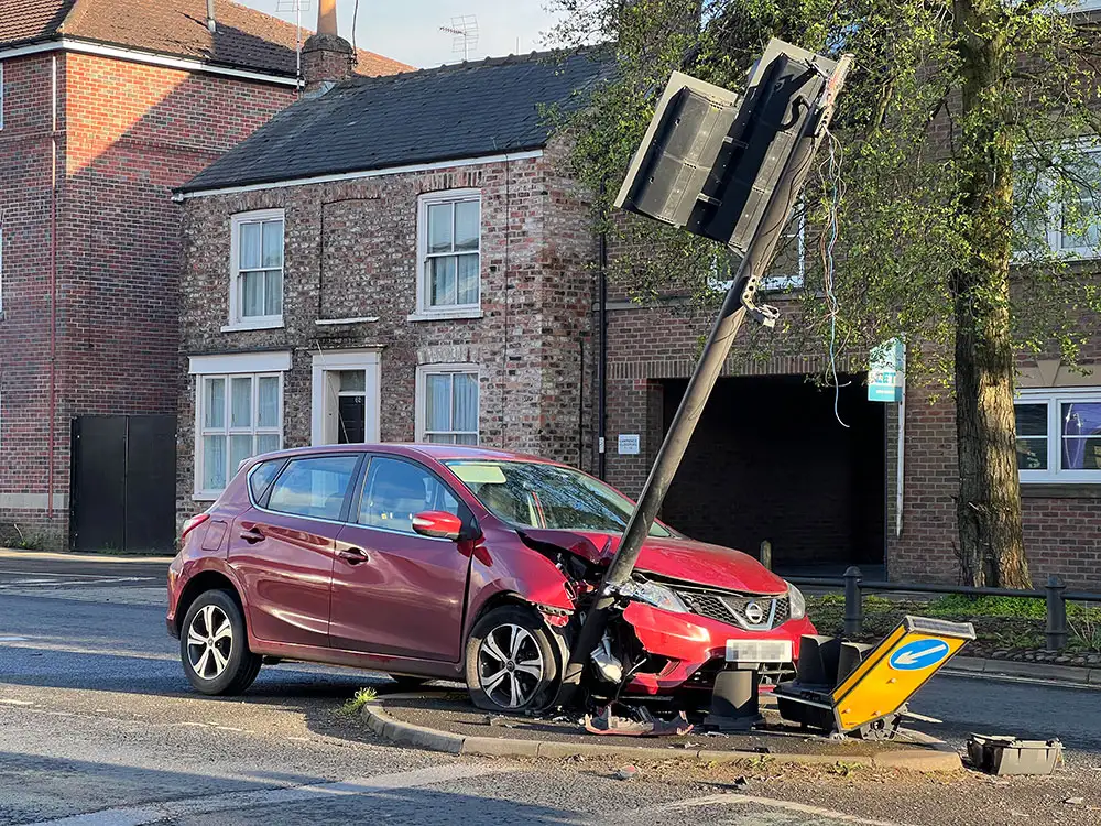 Car crashes into traffic light at busy York junction
