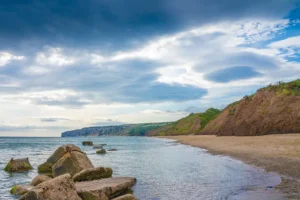 Woman rescued after slipping off a cliff edge at Filey