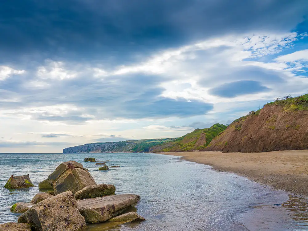 Woman rescued after slipping off a cliff edge at Filey