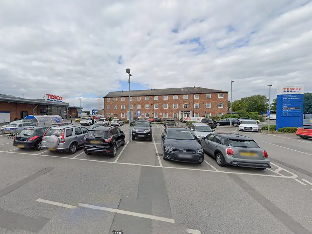 Car drives off after crashing into parked Kia with children inside