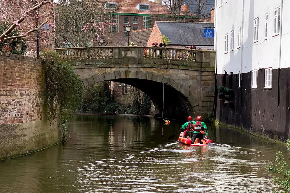 Member of the public held onto person in the river until help arrived