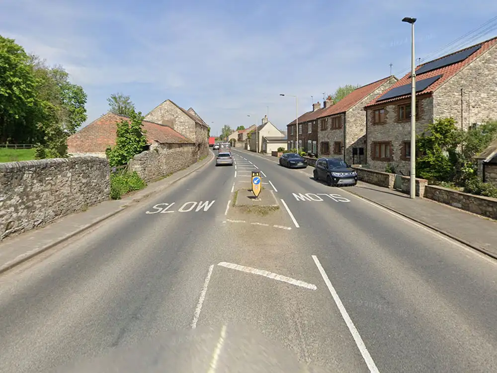 Tractor crashes into wall in North Yorkshire village