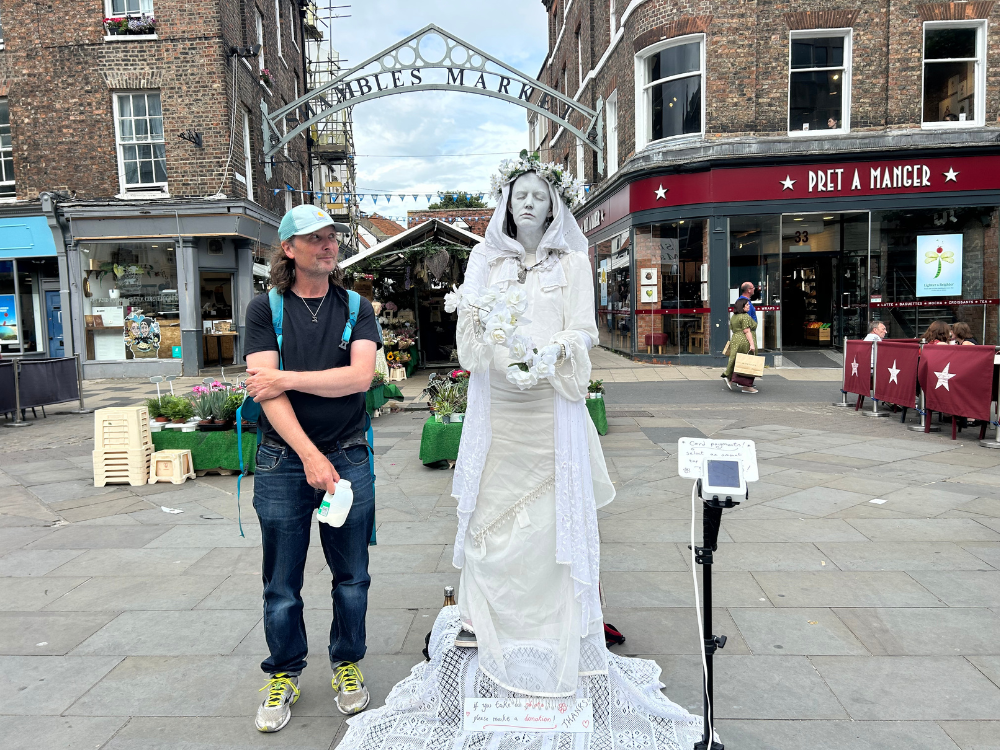 Artist Rory Macbeth (left) with his waxwork Flora Statue. Photograph: Yorkmix