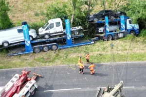 Driver in serious condition after vehicle transporter crashes into tree in York