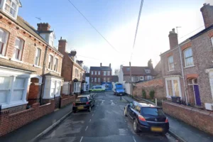 Gang force York cyclist off his bike and punch him