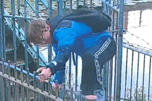 Two men climb over metal railings to steal e-bike in York