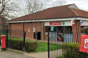 Woman wearing Mickey Mouse top sought over shop theft
