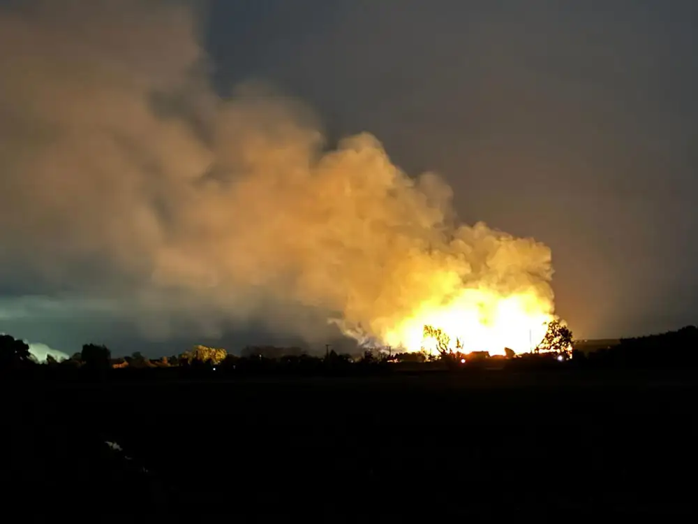 Firefighters tackle huge blaze as neighbours told to keep windows closed