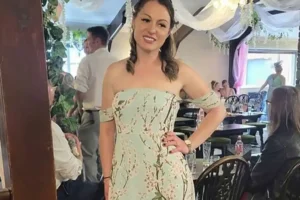 Victoria’s friends gather to remember her with flowers and candles