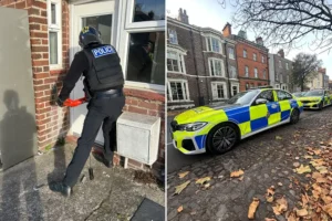 Watch: Police batter down door in York drugs raid as 14 are arrested