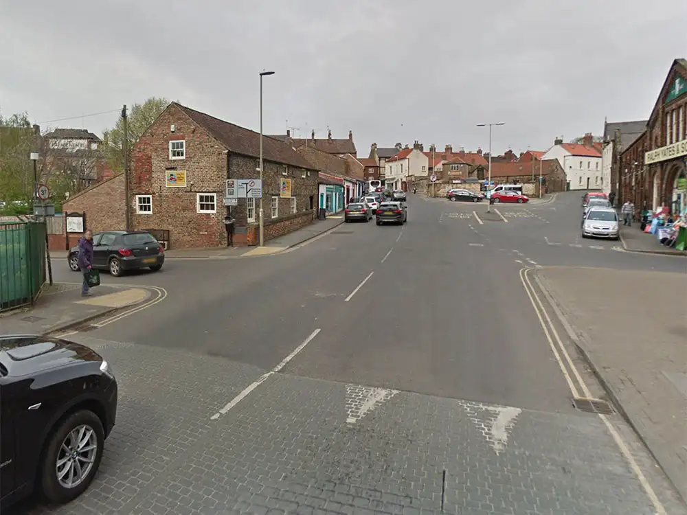 Woman in her 90s seriously hurt after being hit by skip lorry