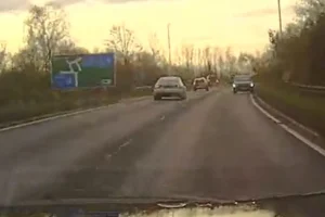Stolen Land Rover drives on the wrong side of the road during police chase