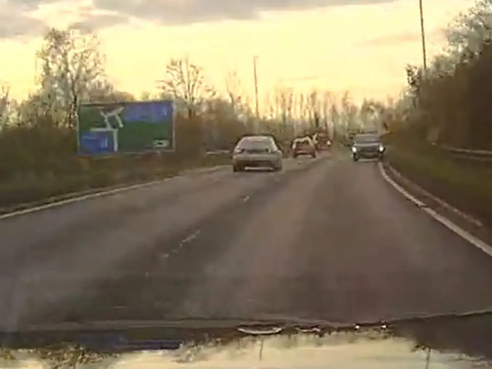 Stolen Land Rover drives on the wrong side of the road during police chase