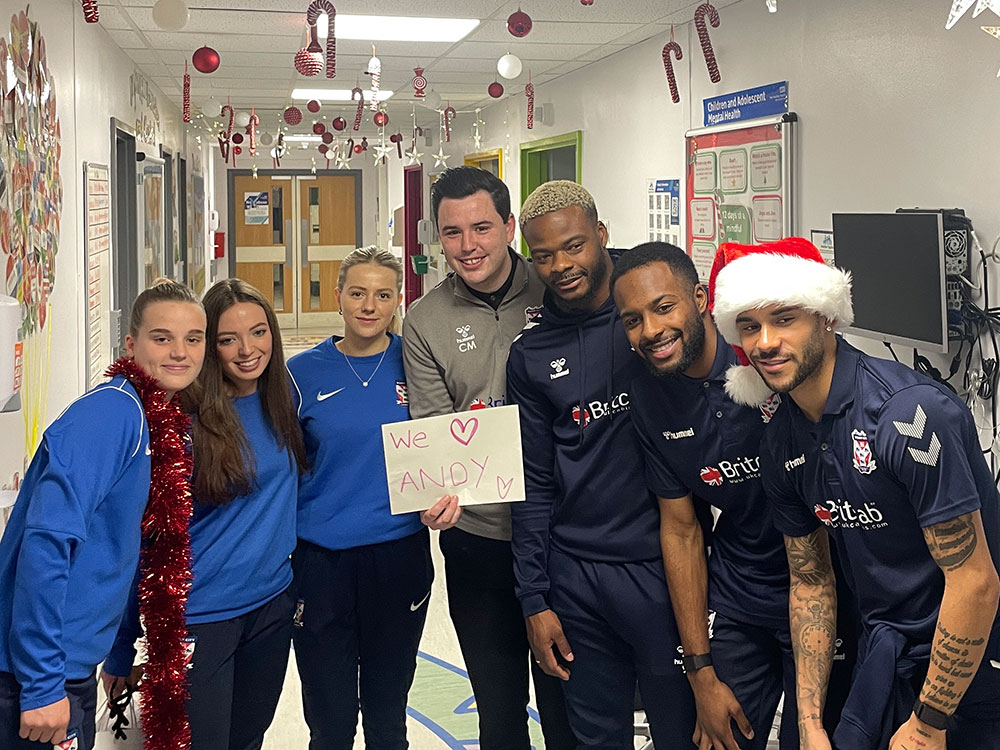 York City players spread Christmas cheer on hospital visit