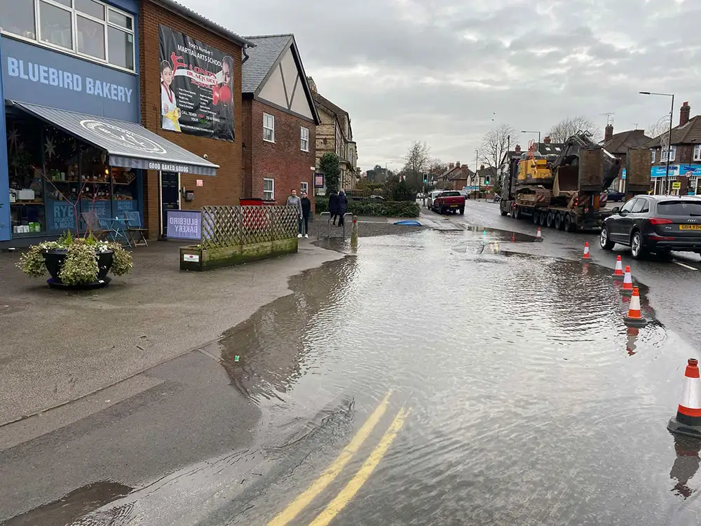 Busy York road flooded after water mains burst