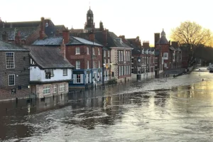 Flooding: Car parks and roads closed, driver rescued from water, river levels peak today