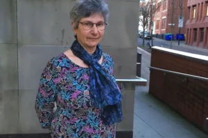 Retired GP who walked along railway line as a climate protest found guilty