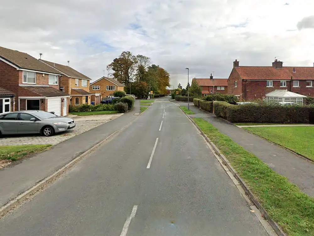 Concern as stranger seen taking photos in a garden in  North Yorkshire village