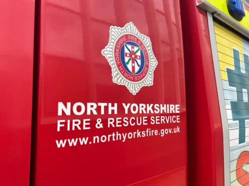 One person treated with oxygen after house fire that closed A64