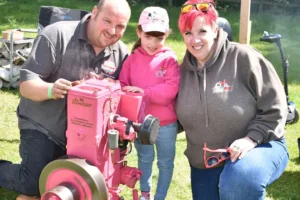 Molly, six, and her vintage engine raising money for charity at Tractor Fest