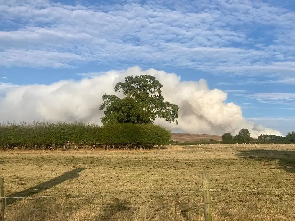 Roads closed and holiday parks evacuated as moor fire spreads
