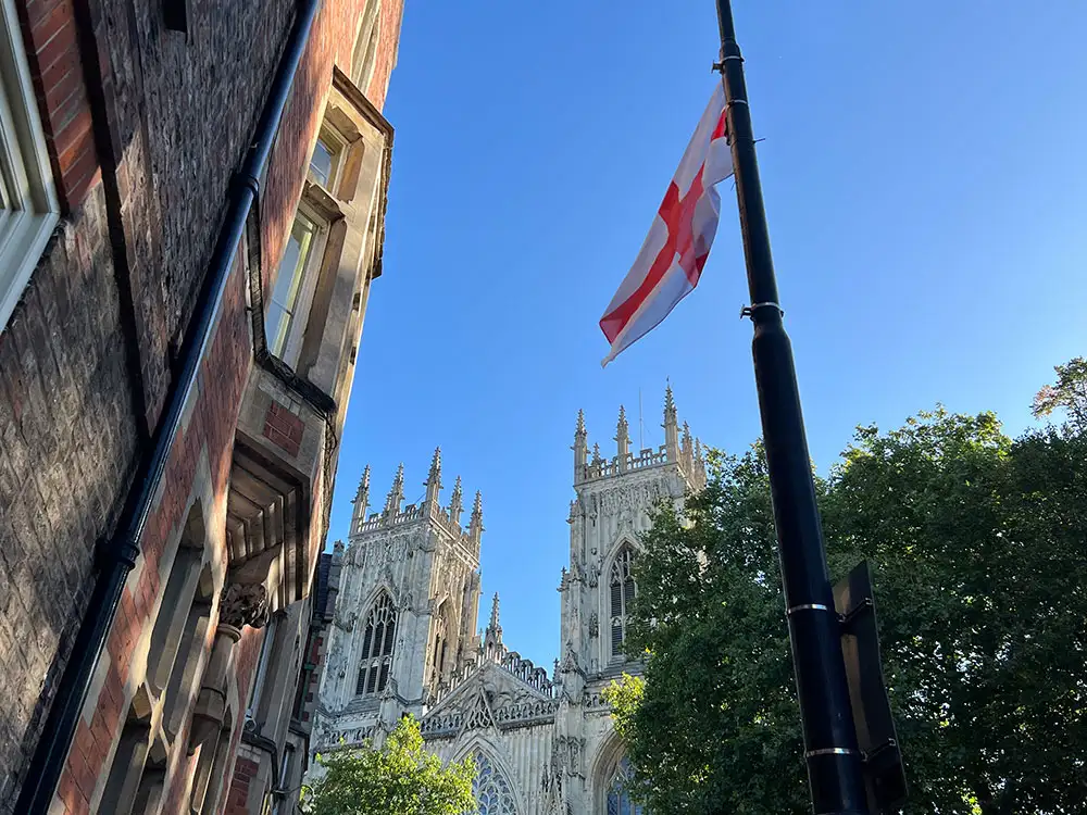 The flags reach York Minster – as political leaders clash over what to do with them