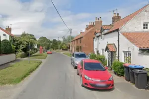 Lorry crashes into vehicle parked in village – then drives off