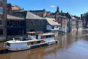 York floods in pix: Soggy on one side of the river, dry on the other